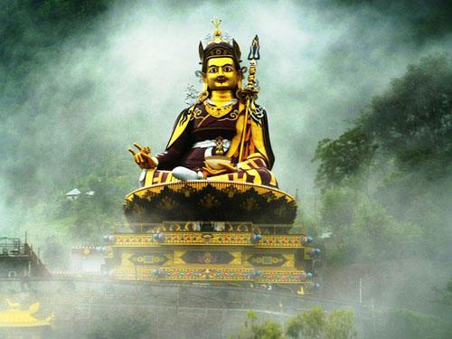 statue of Padmasambhava in mist at Rewalsar